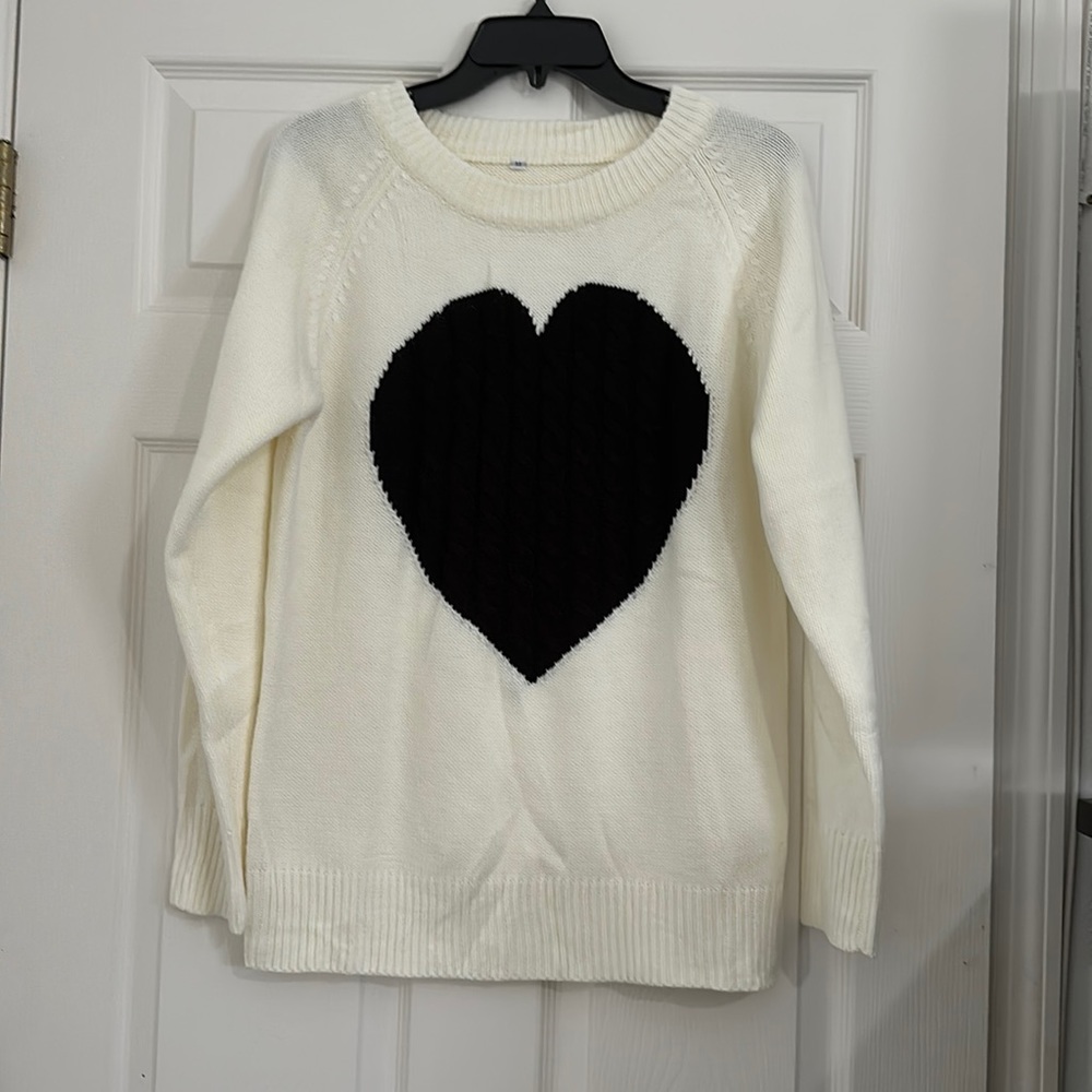 Cream sweater with black heart